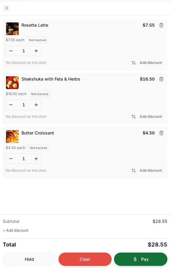 Open check with Rosetta Latte $7.55, Shakshuka $16.50 and Butter Croissant $4.50, subtotal $28.55
